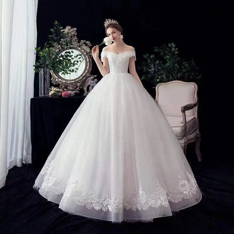 Bridal Gowns with Embellished Detail for Sparkling Look -Wedding Dresses Illusion V-Neck Short Tulle Sequined Embroidery Beading